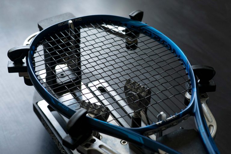 Tennis racket stringing